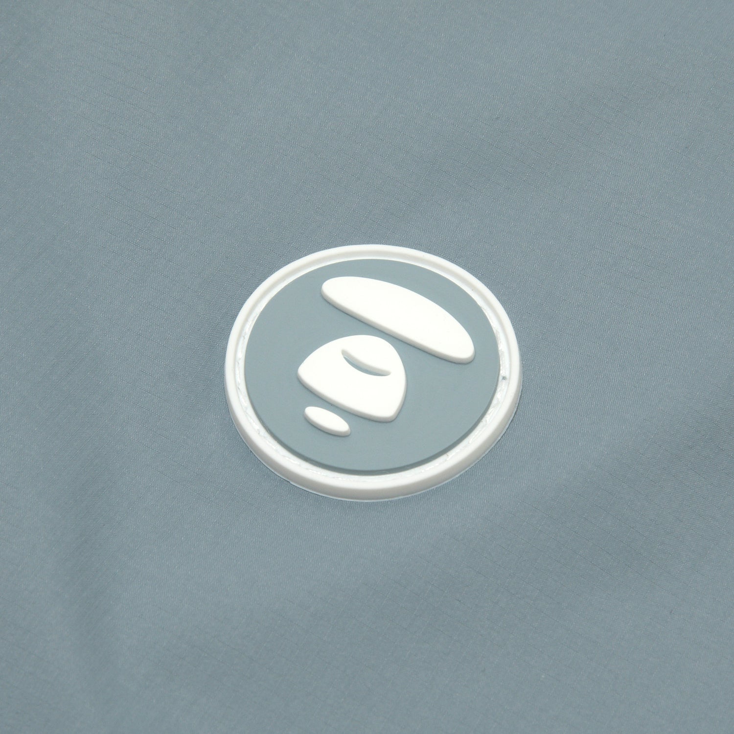 AAPLJM7704XXO/AAPENOW MOONFACE LOGO WINDBREAKER JACKET