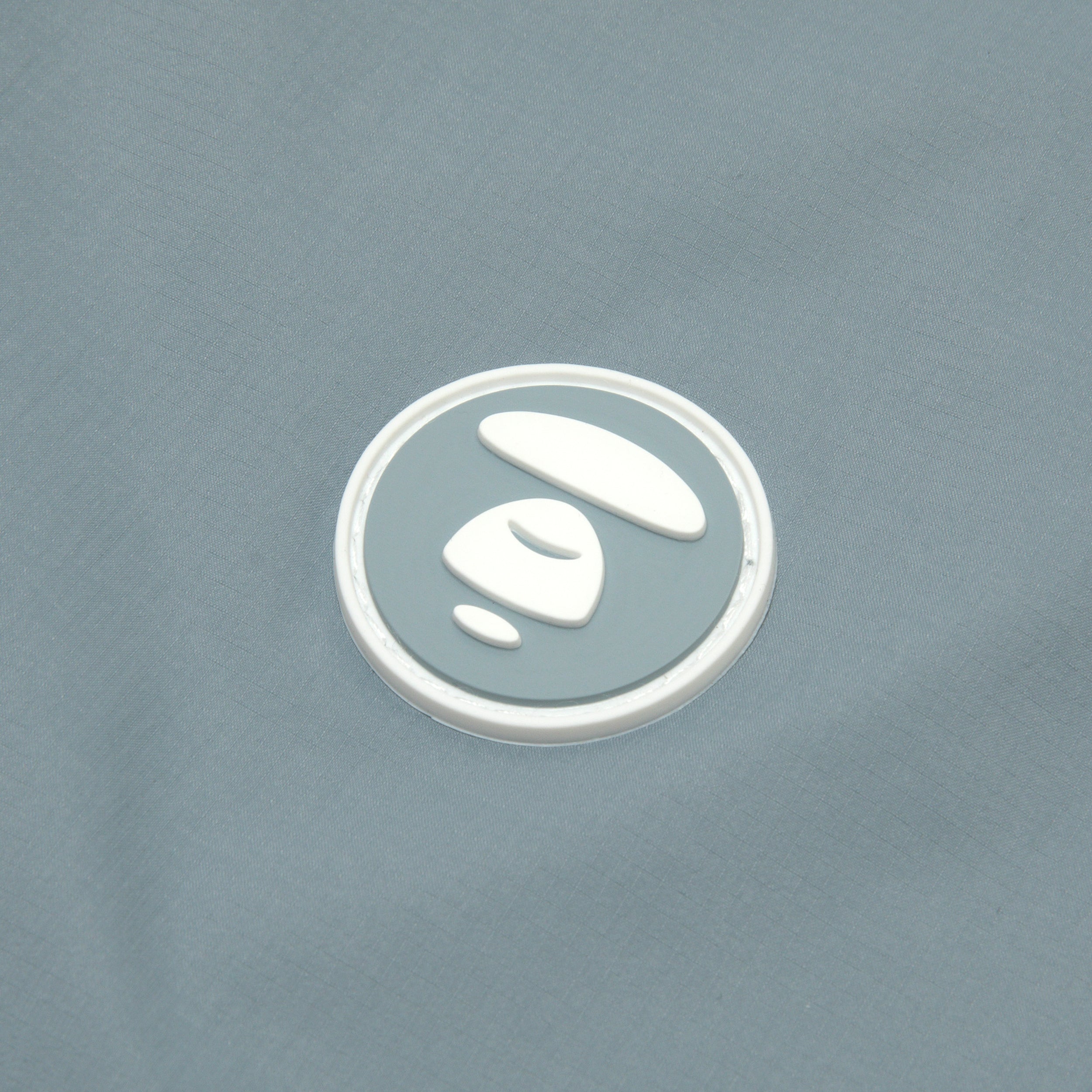 AAPLJM7704XXO/AAPENOW MOONFACE LOGO WINDBREAKER JACKET