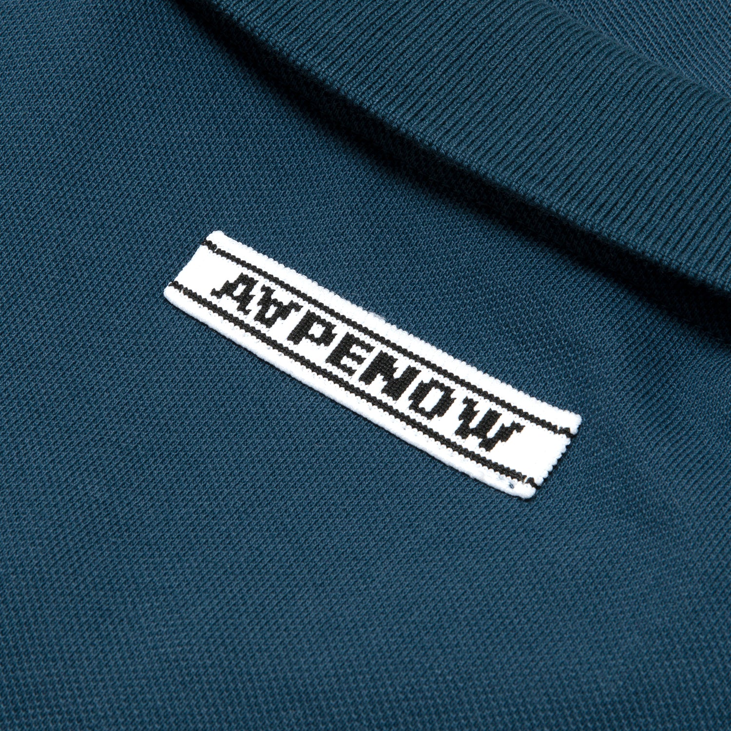AAPENOW MOONFACE LOGO POLO SHIRT