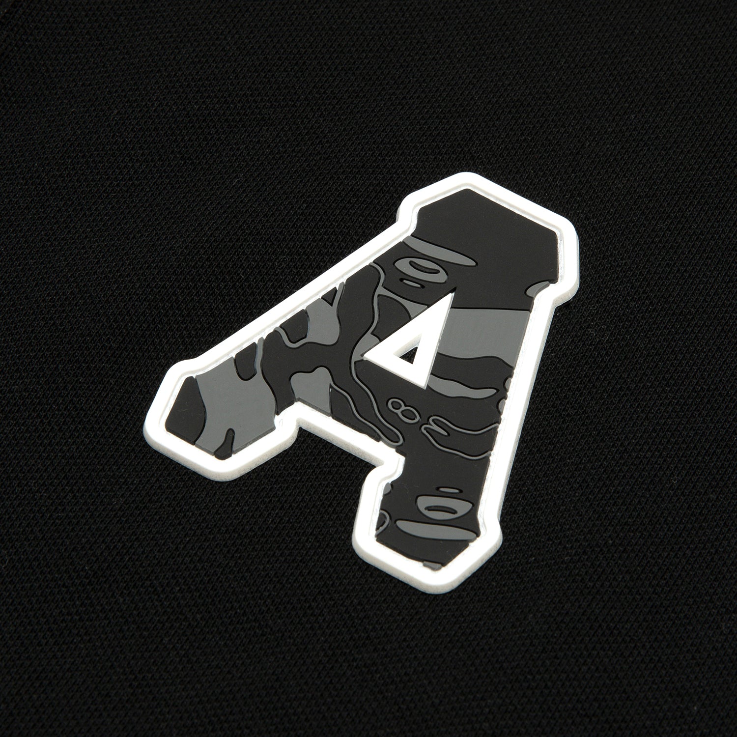 A PATCH POLO SHIRT