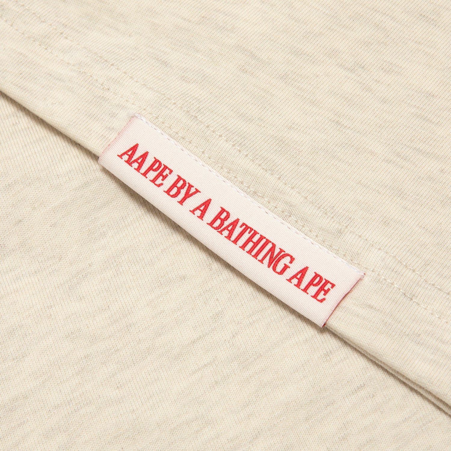 AAPENOW MOONFACE LOGO POLO SHIRT