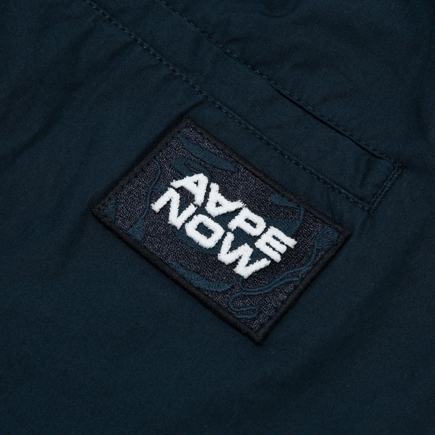 AAPENOW MOONFACE LOGO SHORTS