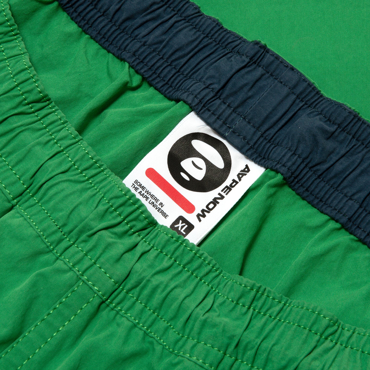 AAPSPMB673XXO/AAPENOW MOONFACE LOGO SHORTS