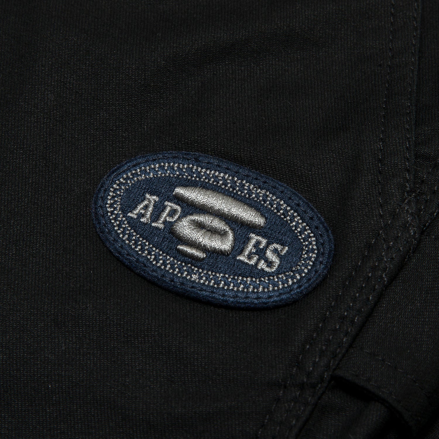 AAPEUNVS MOONFACE LOGO PATCH SHORTS