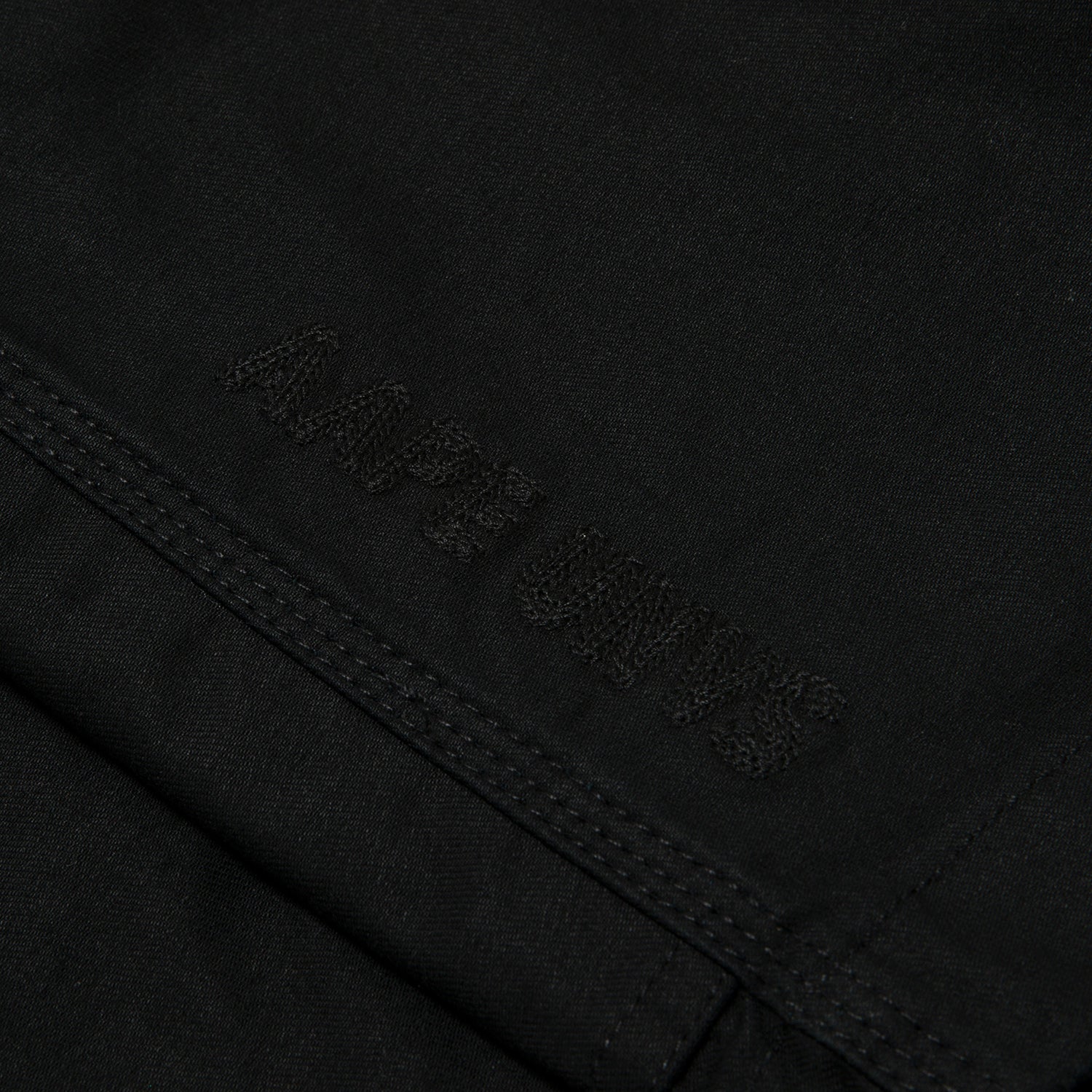 AAPEUNVS MOONFACE LOGO PATCH SHORTS