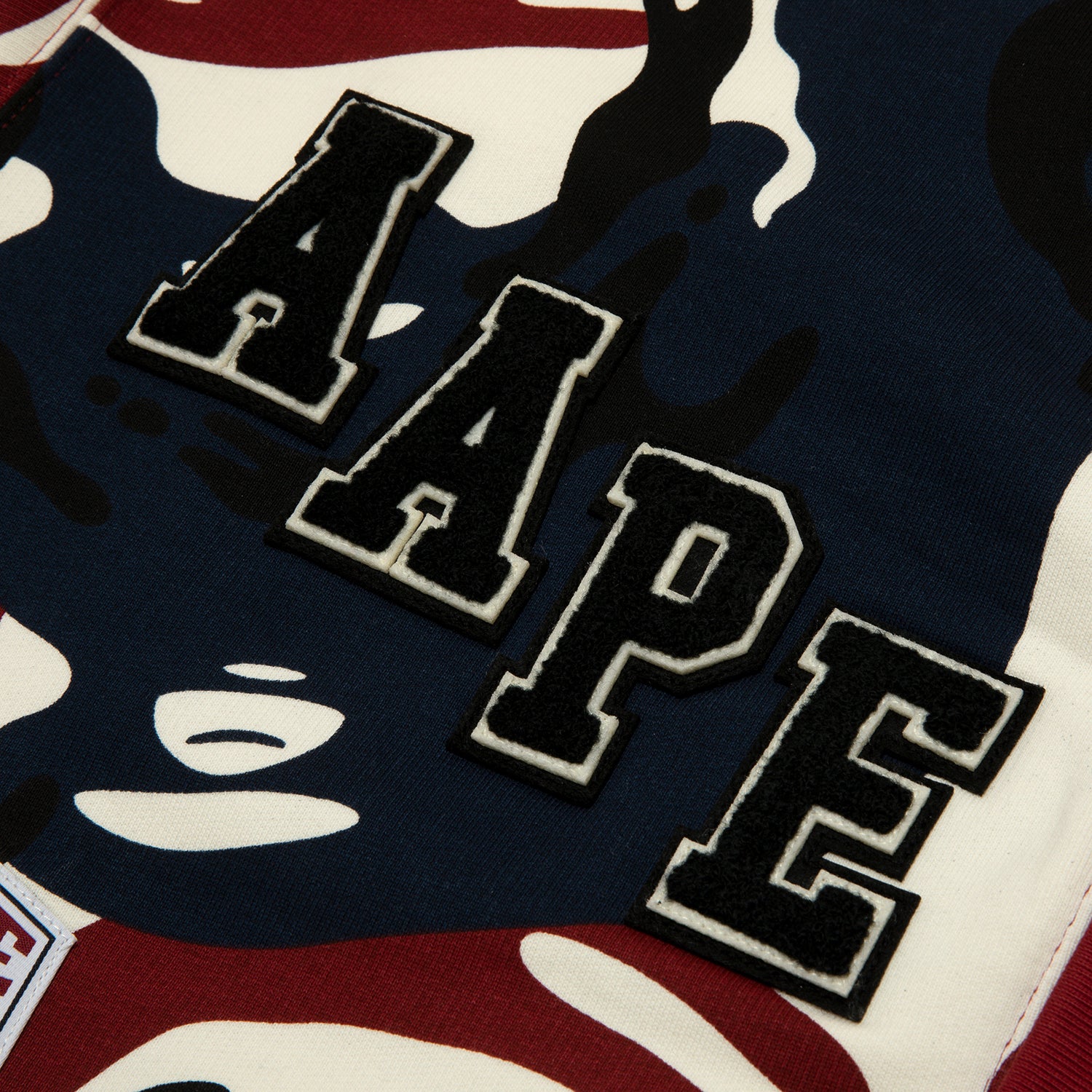 MULTI-LOGO CAMO BUTTON DOWN CARDIGAN