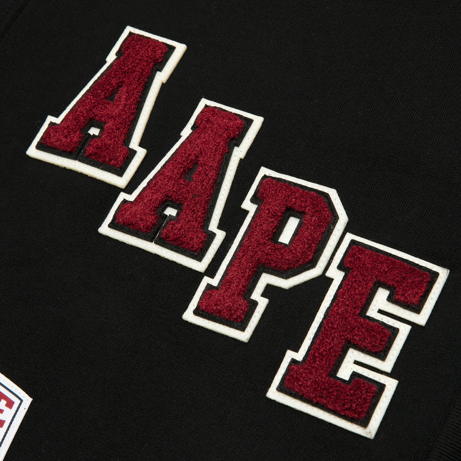 MULTI-LOGO BUTTON DOWN CARDIGAN