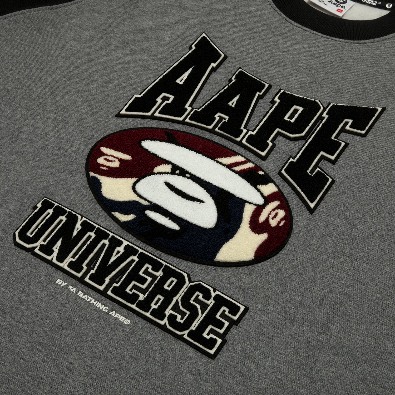 AAPE UNIVERSE MOONFACE LOGO RAGLAN SWEATSHIRT