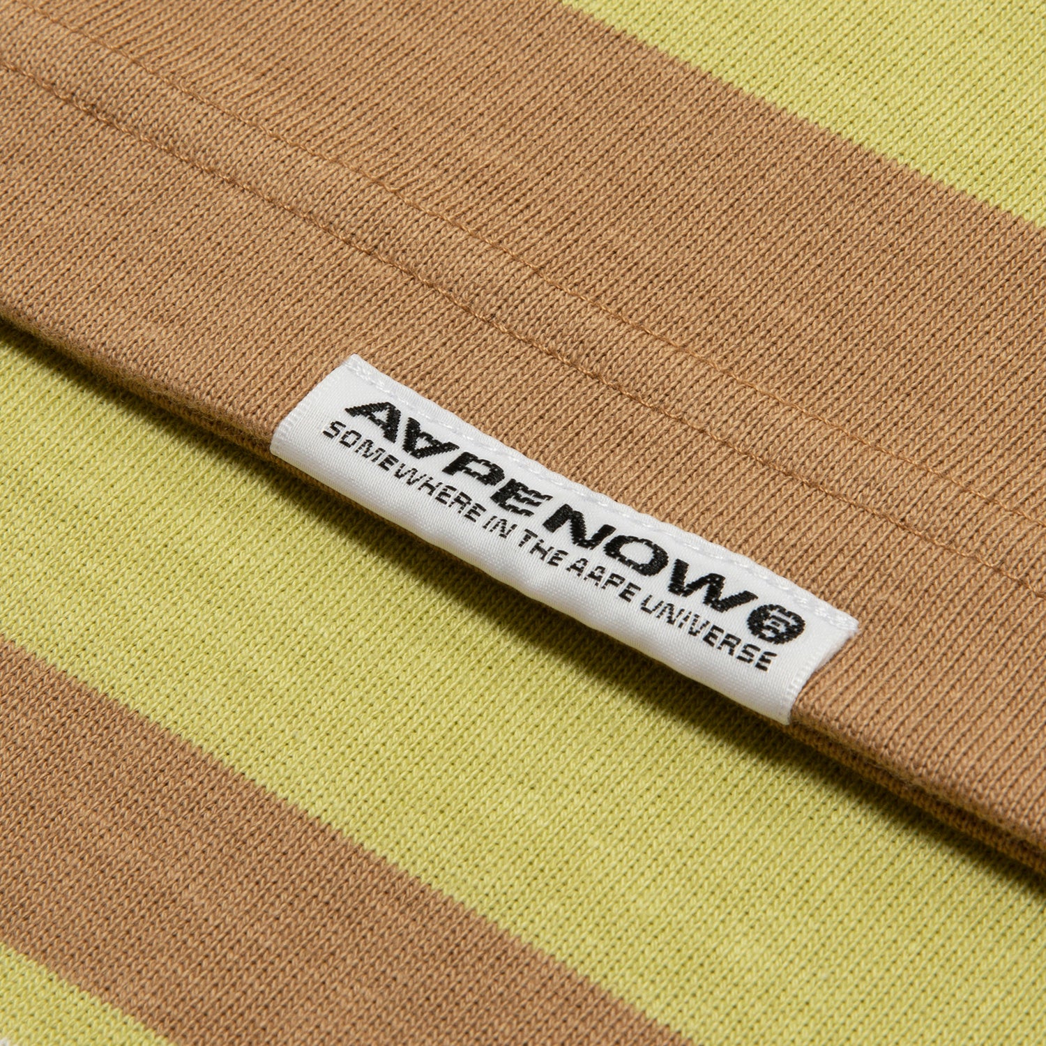 AAPTEM1605XXO/MOONFACE LOGO STRIPE TEE