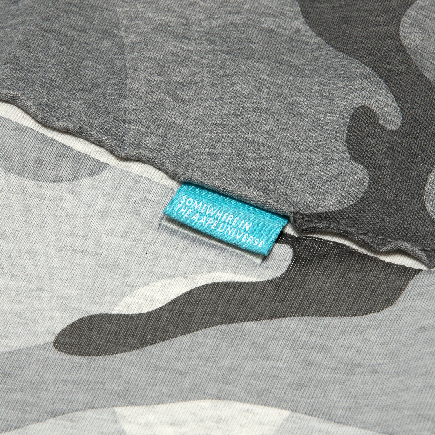 AAPEUNVS MOONFACE LOGO TEE