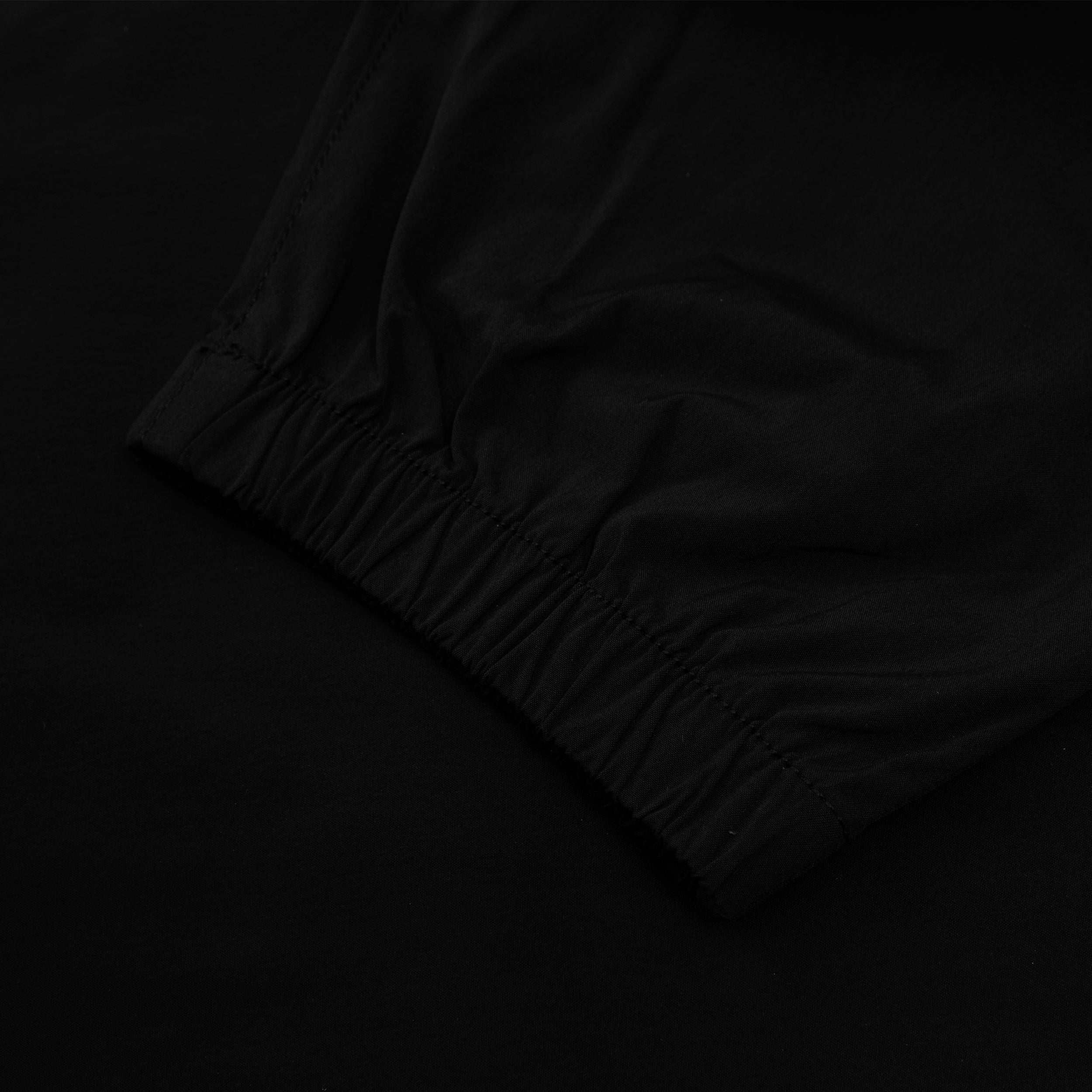 MOONFACE PATCH TRACK PANTS