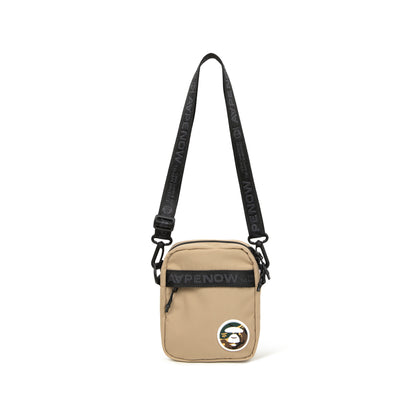 MOONFACE PATCH CROSSBODY BAG