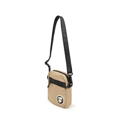 MOONFACE PATCH CROSSBODY BAG