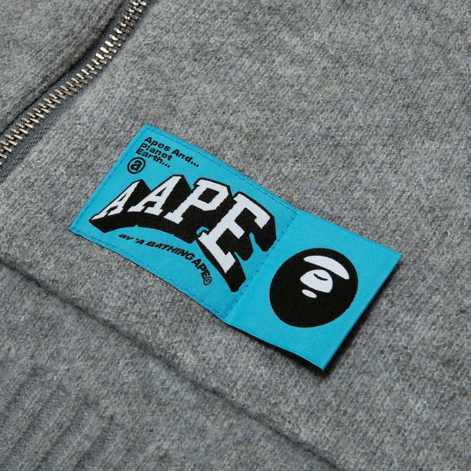 MOONFACE LOGO ZIP-UP KNIT HOODIE