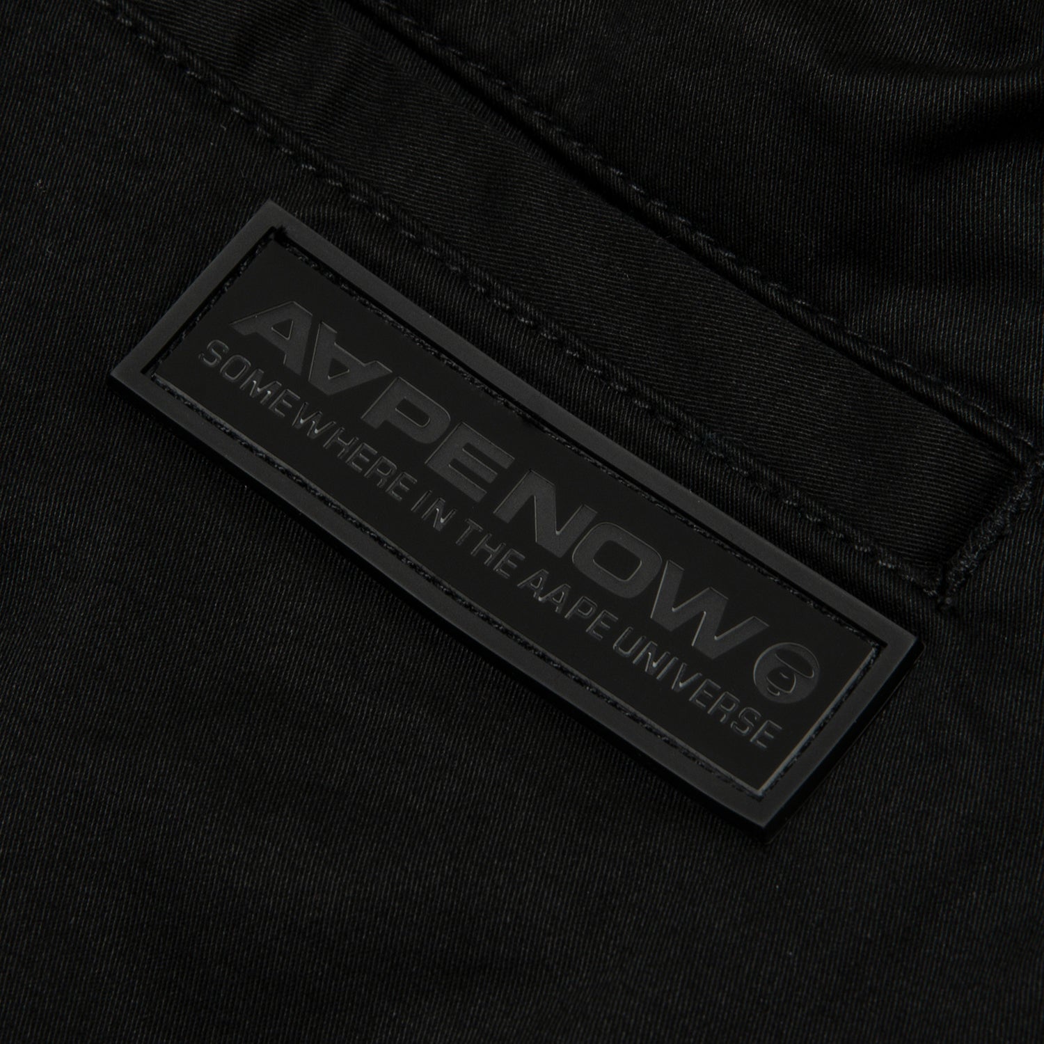 AAPE NOW MOONFACE LOGO WOVEN PANTS