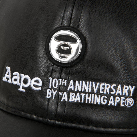AAPE X NEW ERA 10TH ANNIVERSARY MOONFACE FAUX LEATHER CAP