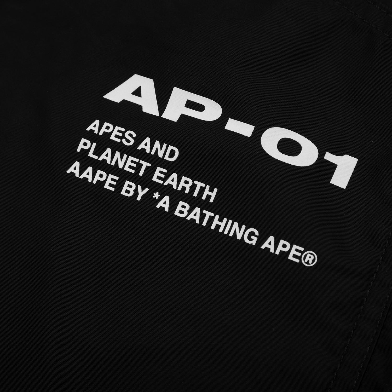 AAPE LOGO PATCH GRAPHIC PRINT ANORAK JACKET