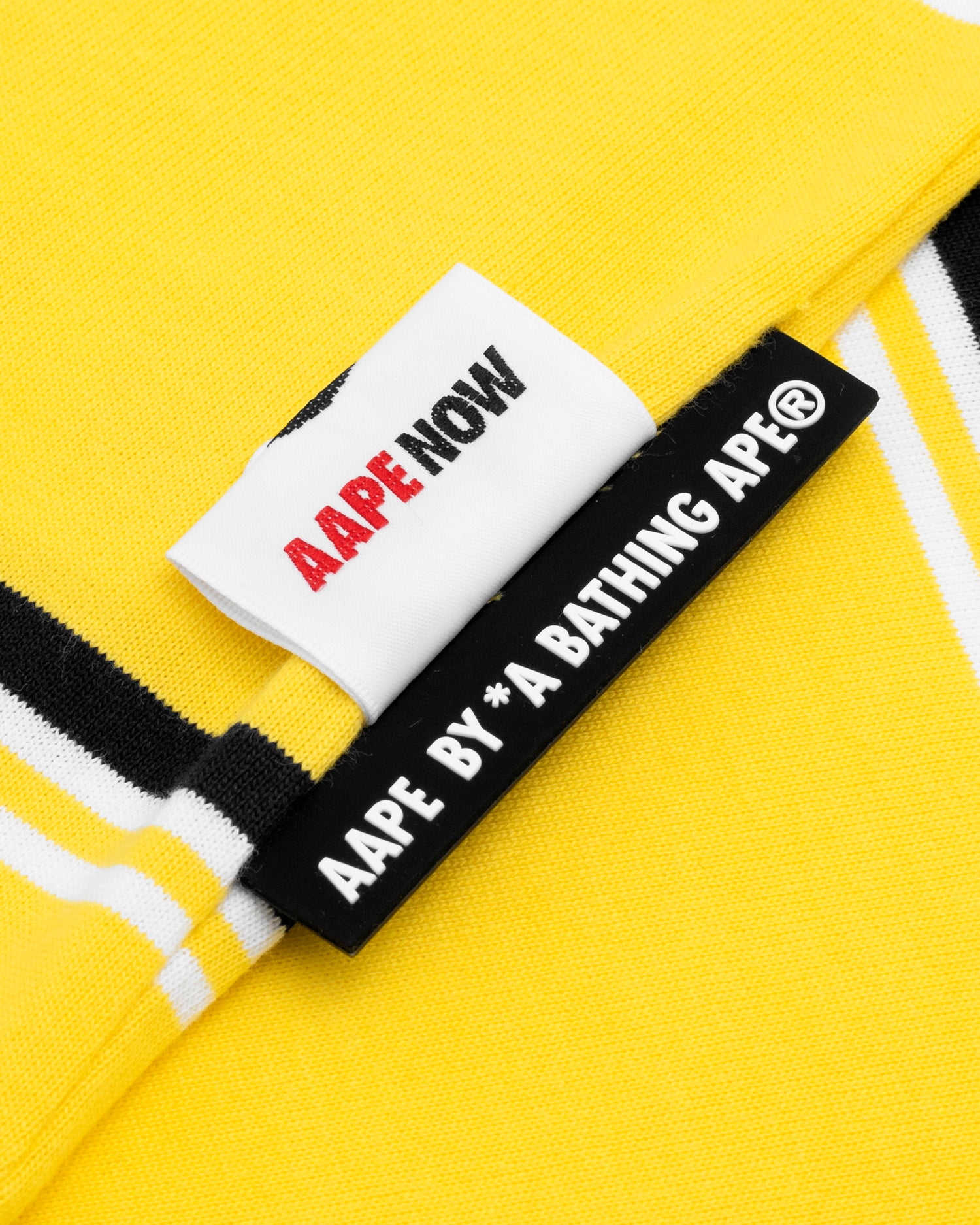 AAPE APE FACE STRIPED POLO SHIRT