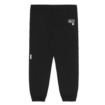 MOONFACE PATCH TRACK PANTS