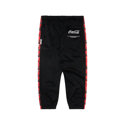 AAPE X COCA-COLA MOONFACE PATCH TRACK PANTS