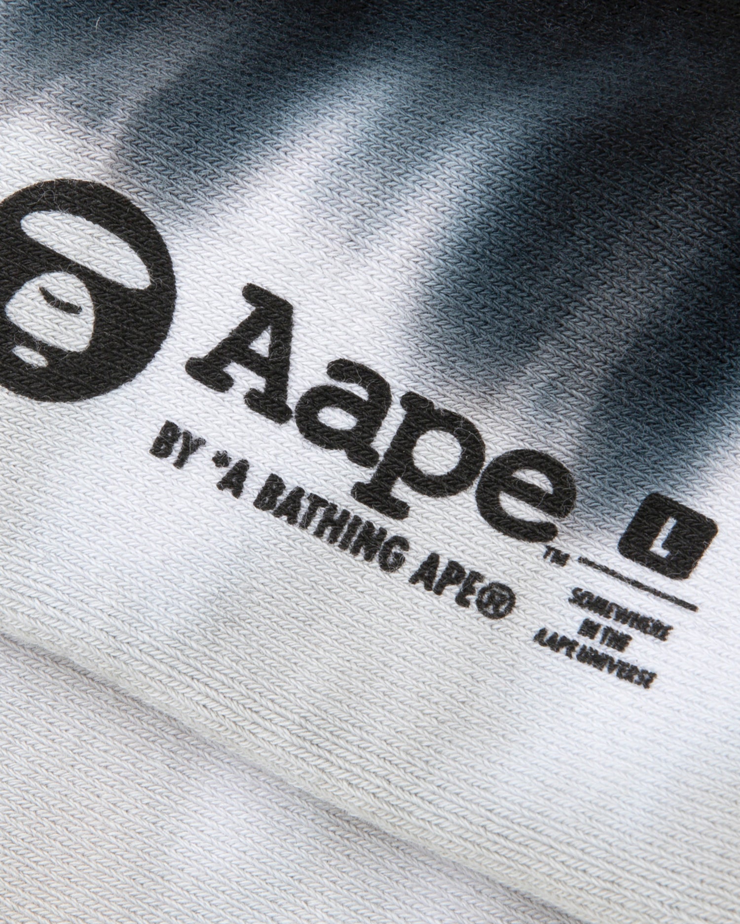 AAPE MOONFACE TIE-DYE STRIPED SOCKS