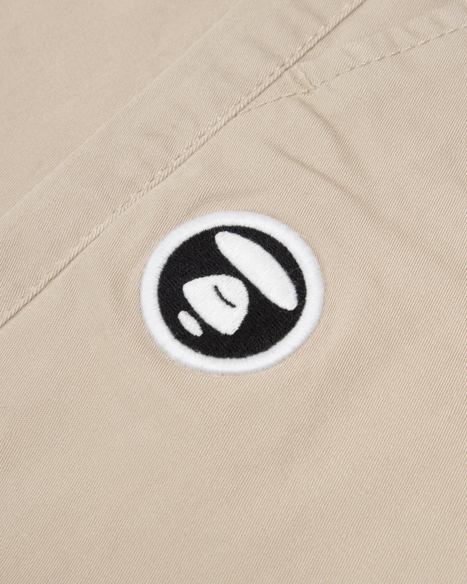 MOONFACE EMBROIDERED TWILL SHORTS