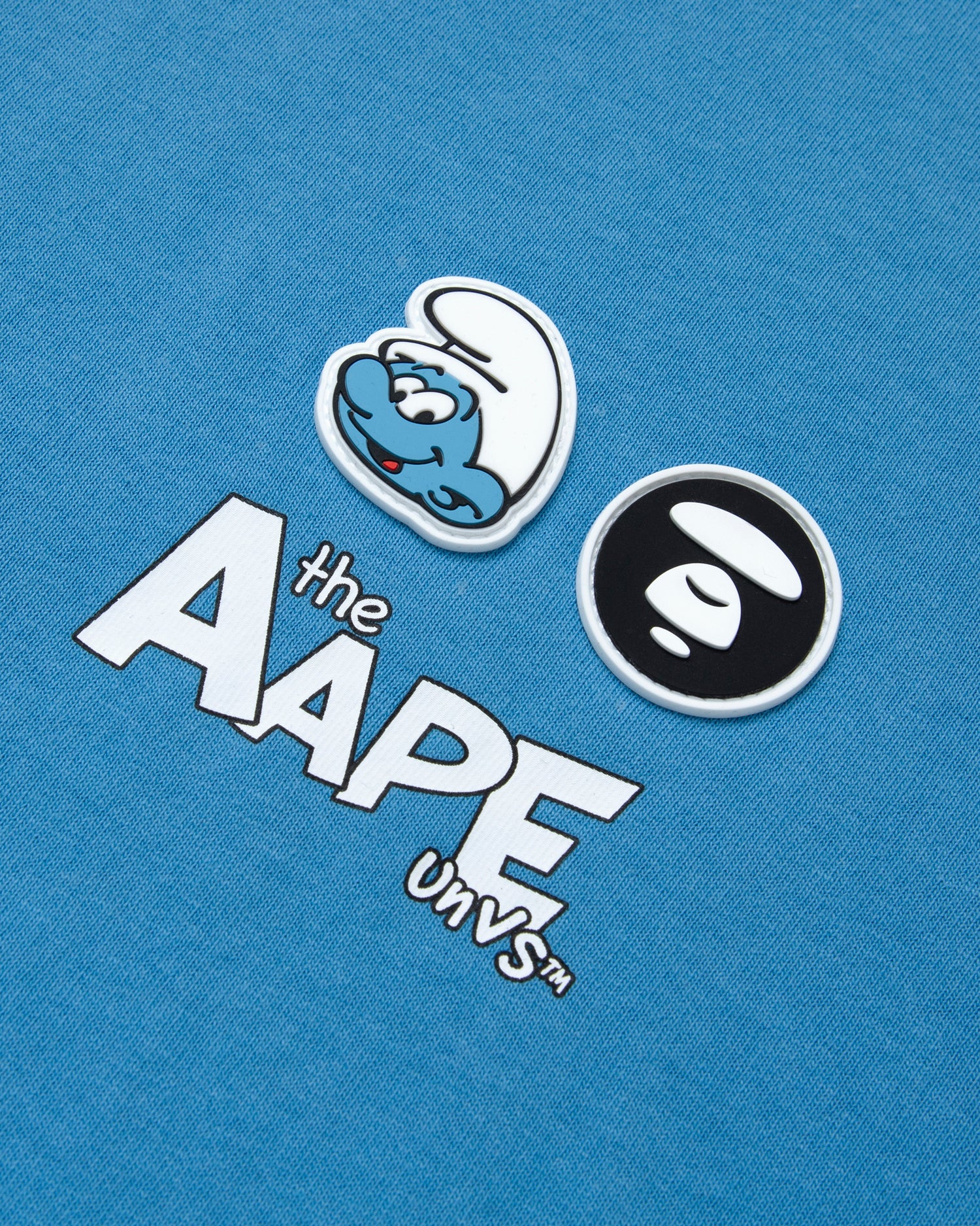 AAPE X THE SMURFS MOONFACE PATCH GRAPHIC TEE