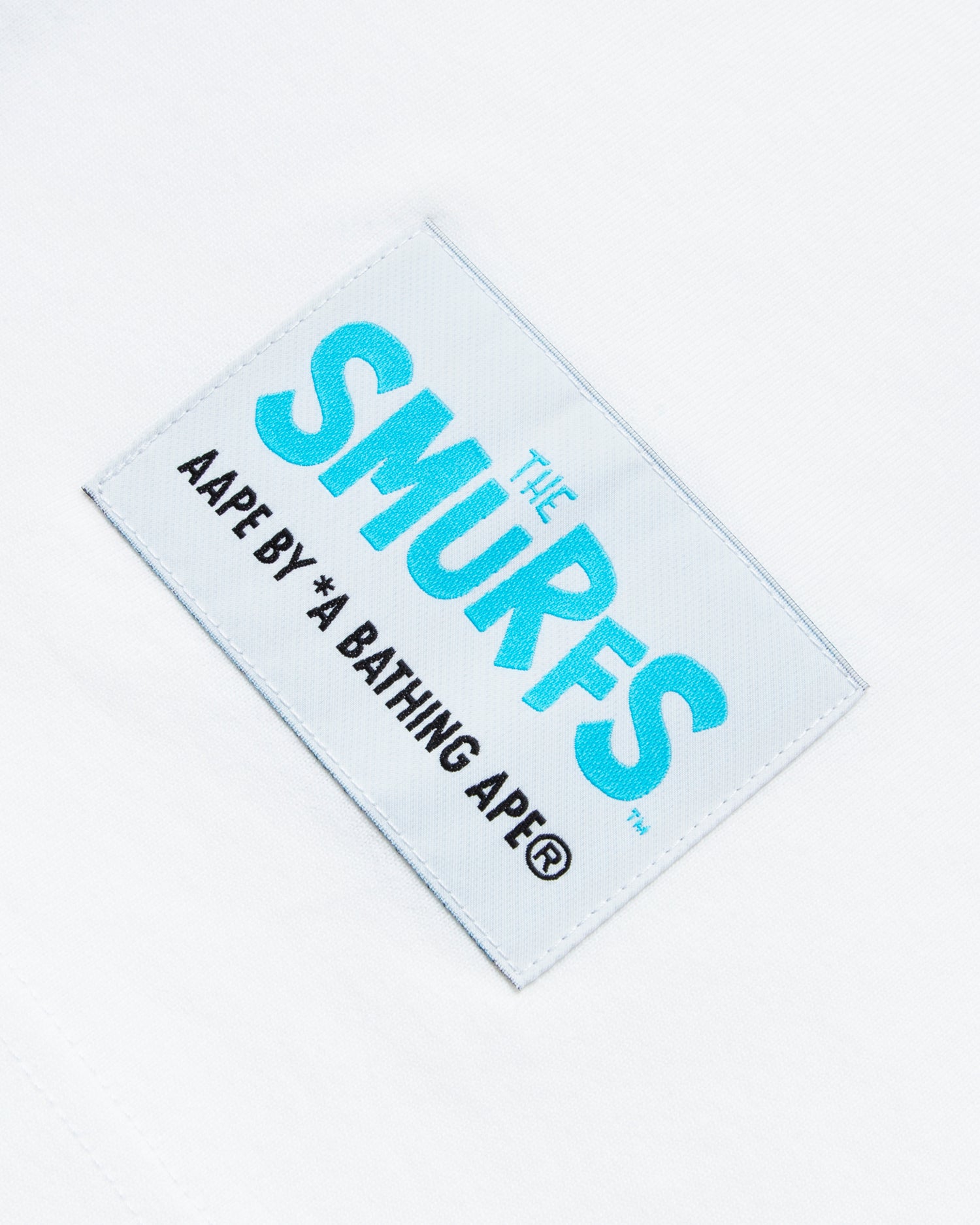 AAPE X THE SMURFS MOONFACE PATCH GRAPHIC TEE