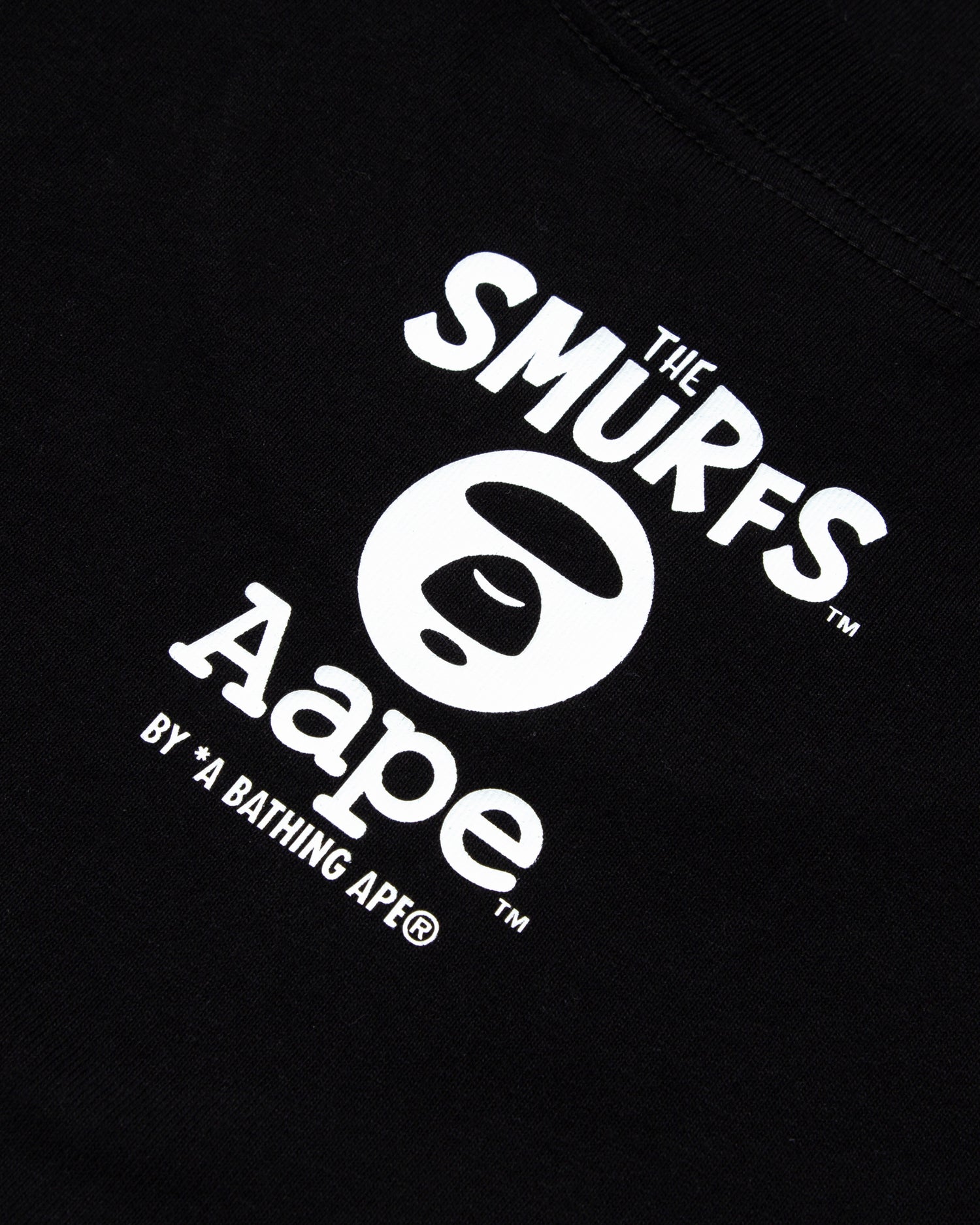 AAPE X THE SMURFS MOONFACE GRAPHIC TEE