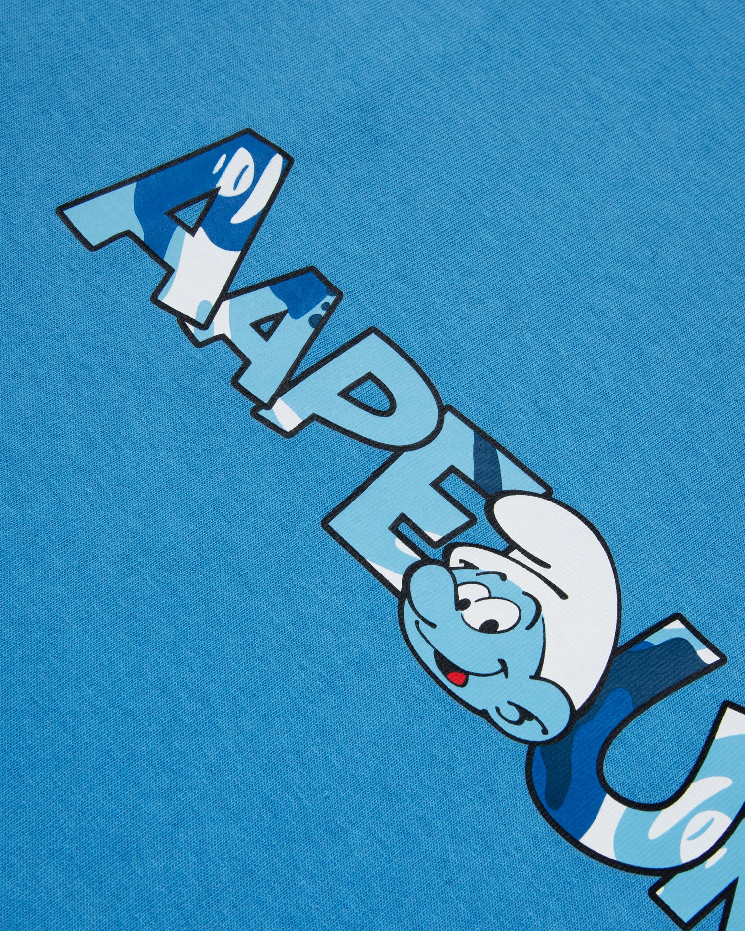 AAPE X THE SMURFS MOONFACE GRAPHIC TEE