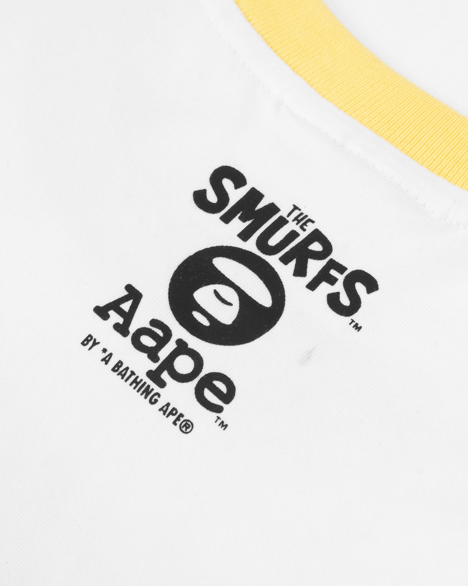 AAPE X THE SMURFS MOONFACE GRAPHIC CROPPED TEE